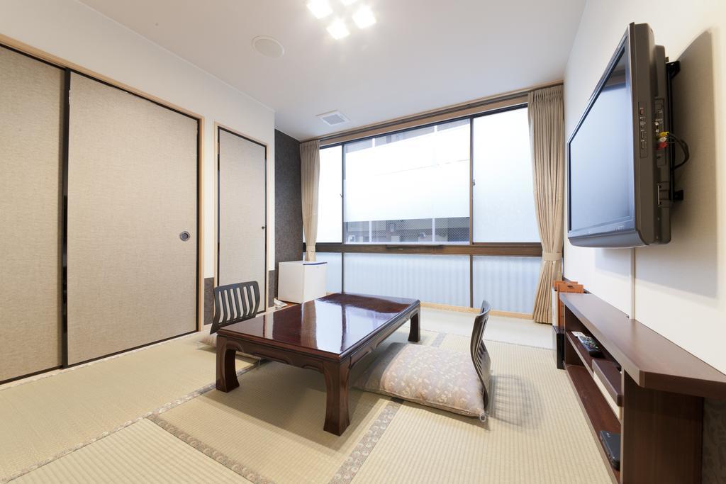 Hotel Kikunoya Hatsukaichi Zimmer foto